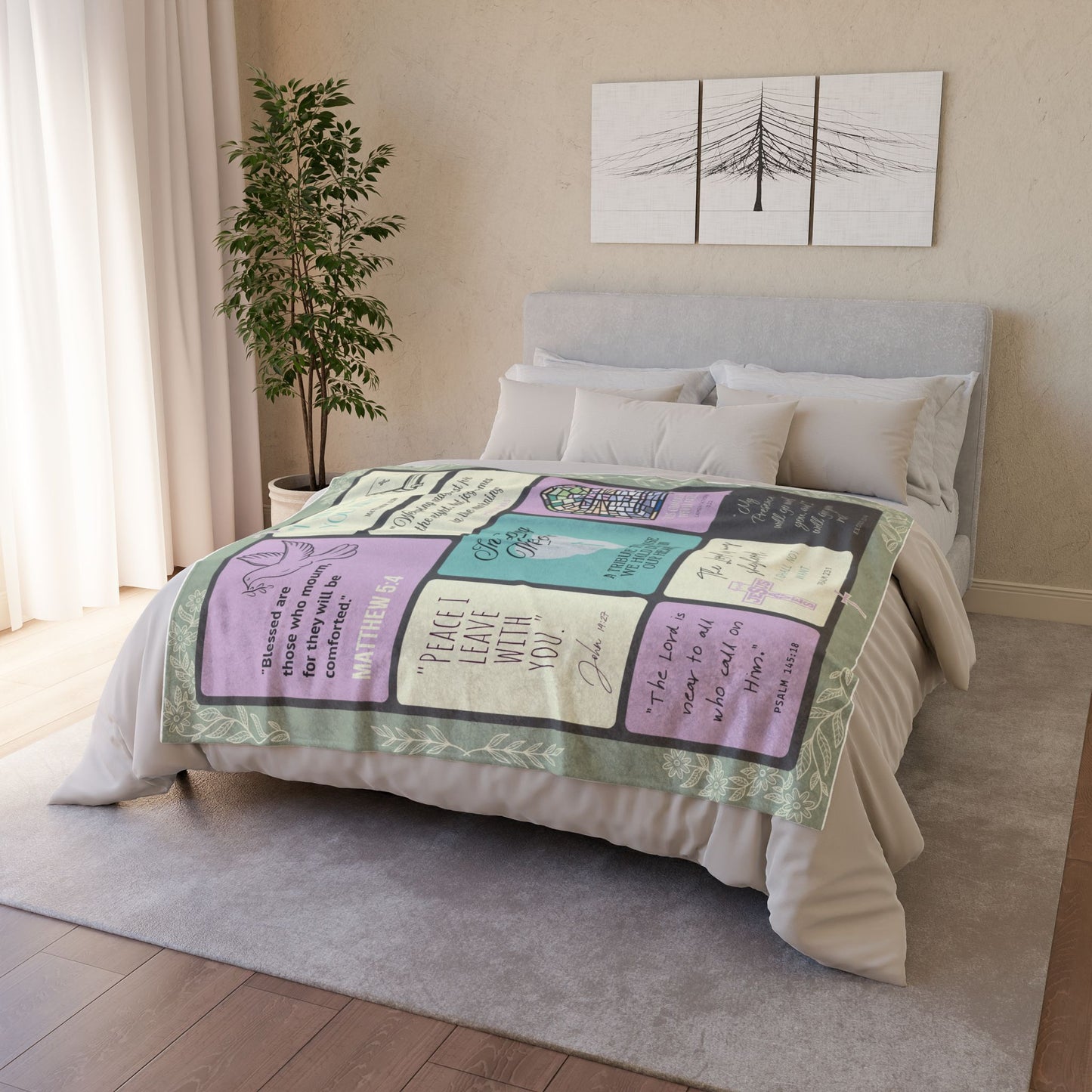 Christian memorial blanket with an "In Loving Memory" scripture design featuring uplifting Bible verses, a cross, dove, and stained glass imagery, spread across a neatly made bed with pillows in a serene bedroom setting, including quotes from Matthew 5:4, John 16:33, Psalm 145:18, and more.