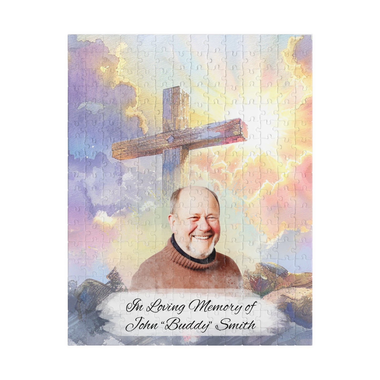 Custom memorial puzzle with a sacred cross keepsake design, featuring a photo of John "Buddy" Smith, personalized with "In Loving Memory of John 'Buddy' Smith," available in 252 or 520 pieces, set against a heavenly sky background with scattered pieces.