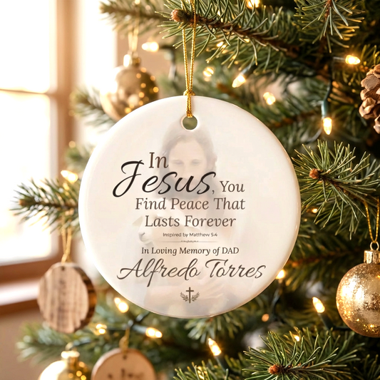 Decorative Christmas ornament with a message on a Christmas tree.